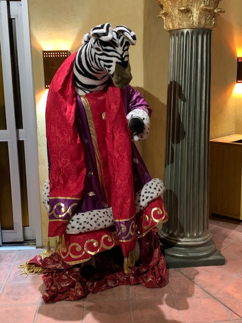 A large stuffed animal zebra.