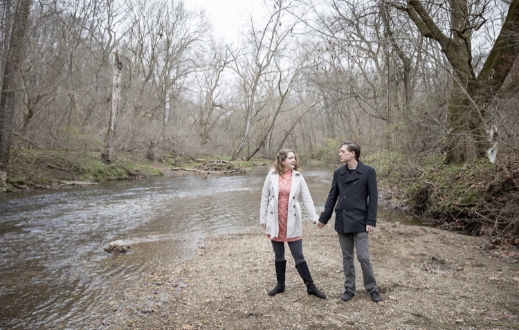 The author and her husband standing by a creek at a Pennsylvania park